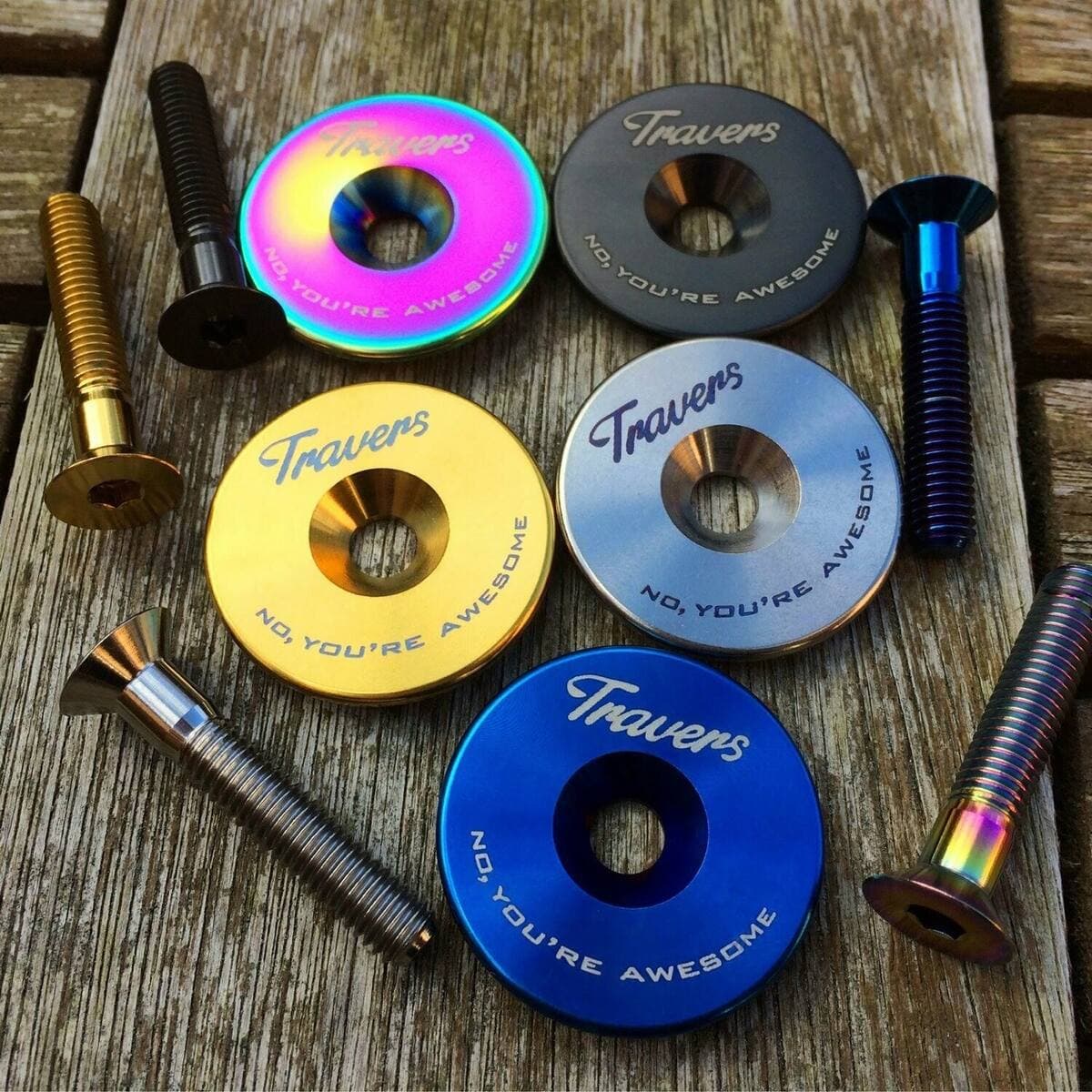 Travers titanium headset top caps in gold, rainbow, blue and natural