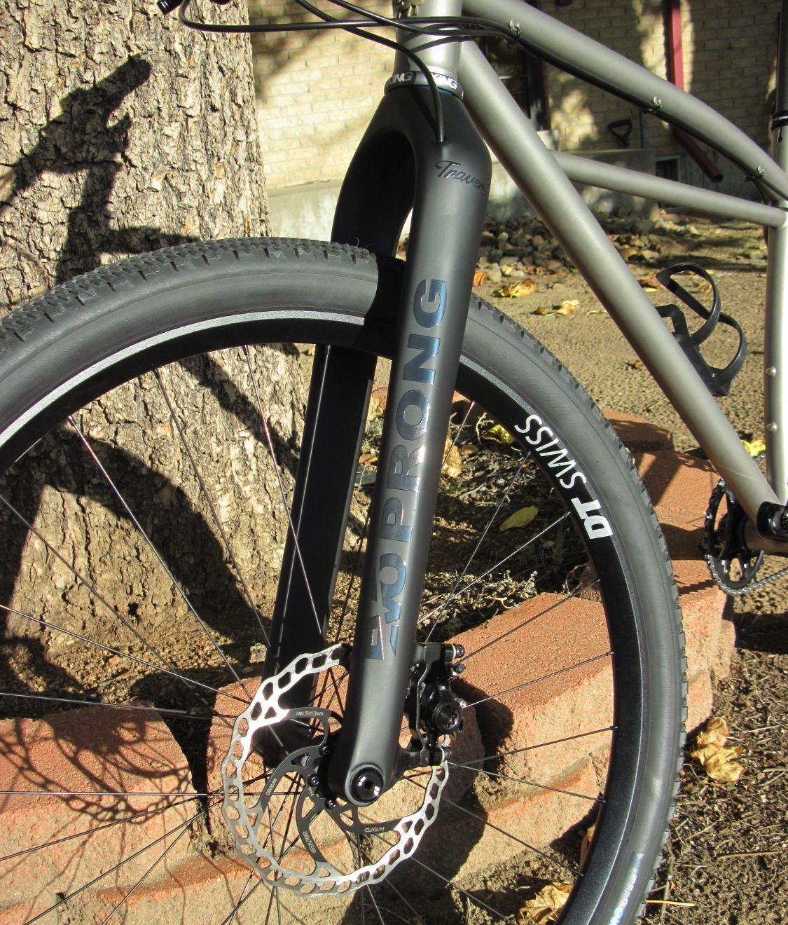 Close-up of the EVO Prong fork leg, brake caliper and rotor